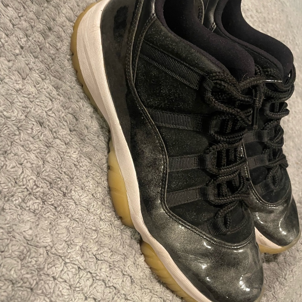 Stylish Black Sneakers with Tan Soles